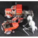 A large metal 'King Hauler' truck finished in red and chrome, together with a metal motorbike and