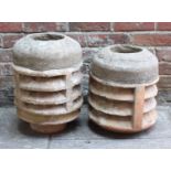 Two graduated stone chimneys/planters with vented sides, tallest measures 47cm