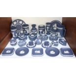 SECTION 2. A large quantity of Wedgwood dark blue Jasperware including plates, vases, trinket boxes,