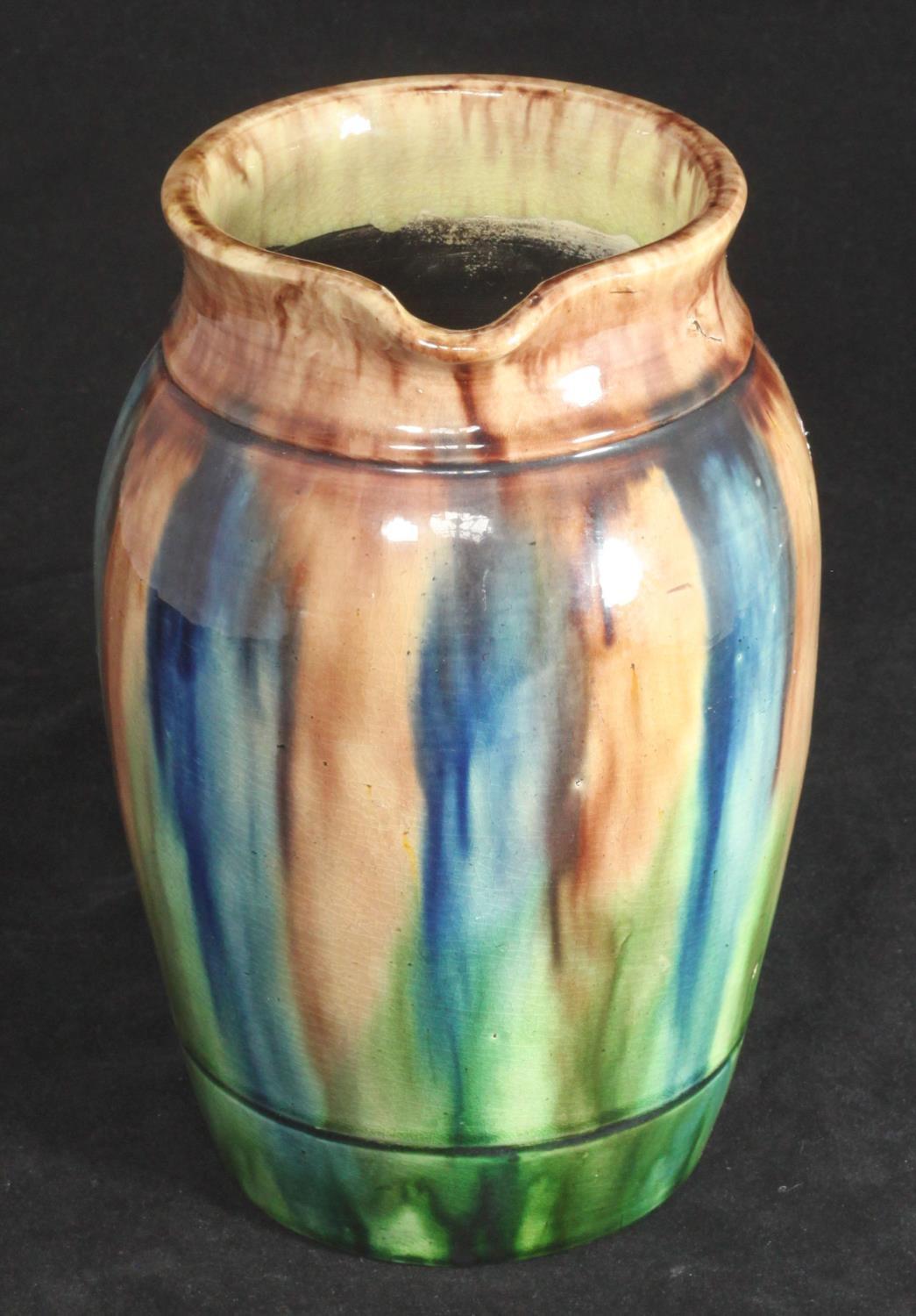 A 20th century 'Whieldon' style pottery jug, finished in a blue, brown and green glaze, impressed - Image 3 of 4