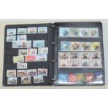 A loose-leaf stock card album of stamps, mint and used unmounted, relating to travel including