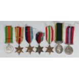A collection of assorted medals comprising a British Army Territorial Efficiency Medal (George VI)