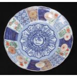 An 18th Century Oriental plate, bearing a Kangxi mark