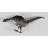 A silver pin cushion modelled as a pheasant by S Blanckensee & Son Ltd. with purple velvet