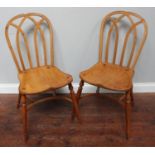 Stuart Linford, a pair of Gothic inspired yew and oak standard chairs, signed, 100x160cm