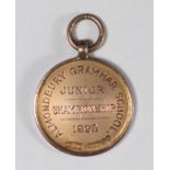 A 9ct gold School Sports medal, Almondbury Grammar School, 1925, D. Thorpe, 6.6g