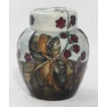 A Moorcroft pottery ginger jar and cover in the 'Bramble' pattern designed by Sally Tuffin, the base
