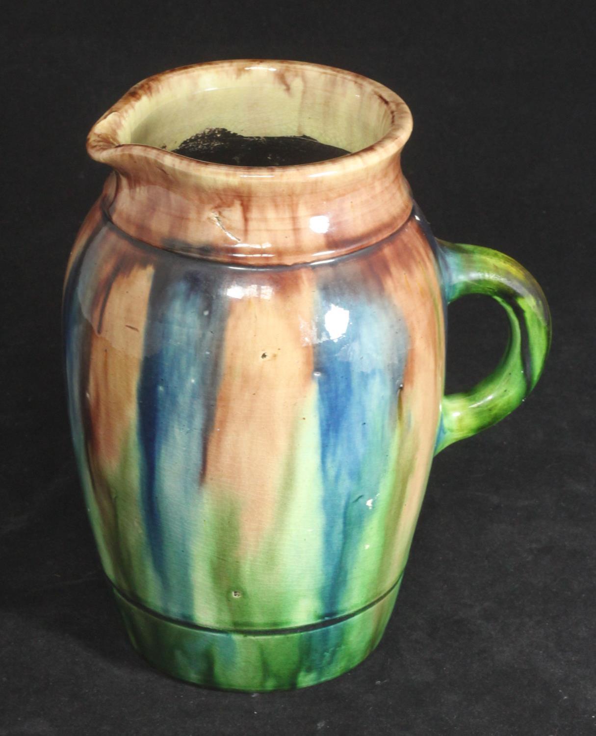 A 20th century 'Whieldon' style pottery jug, finished in a blue, brown and green glaze, impressed - Image 2 of 4