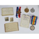 A 1914 Star, a Victory medal and a War medal, all named to 'R.M. A.7297. Gunner R.E. Roberts, R.M.