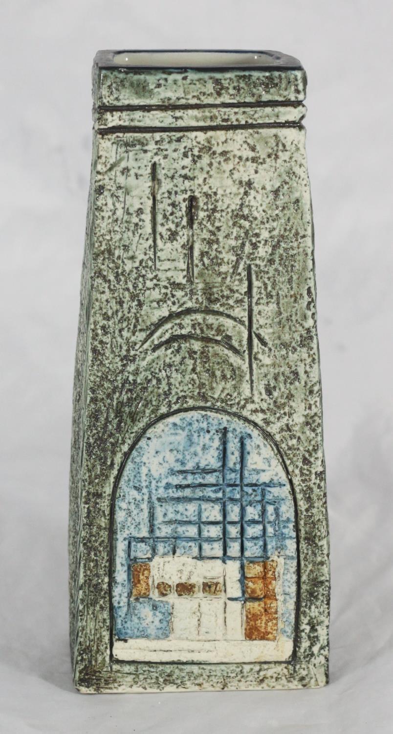 A Troika pottery 'Coffin' vase glazed in green, orange and blue, marked 'SK' to base, approx. 17cm