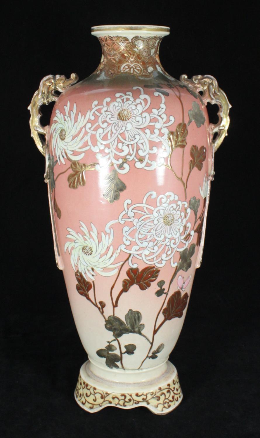 A late 19th /early 20th century Japanese pottery vase with stylised dragon handles and enamel floral