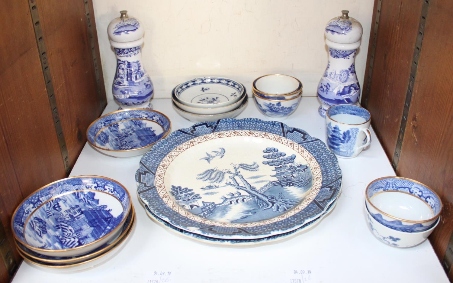 SECTION 26. A collection of assorted blue and white ceramics including two Willow Pattern plates, an