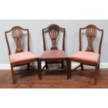A Harlequin set of six 19th century mahogany standard chairs with pierced splats and drop-in