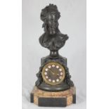 A 19th Century French figural clock with rouge marble base.