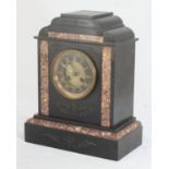 A Victorian black slate and red marbled mantel clock, black dial with gold Roman numerals, approx.