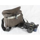 A Canon T50 camera in fitted bag, with 52mm 'Sun' lens, flash and a small quantity of accessories