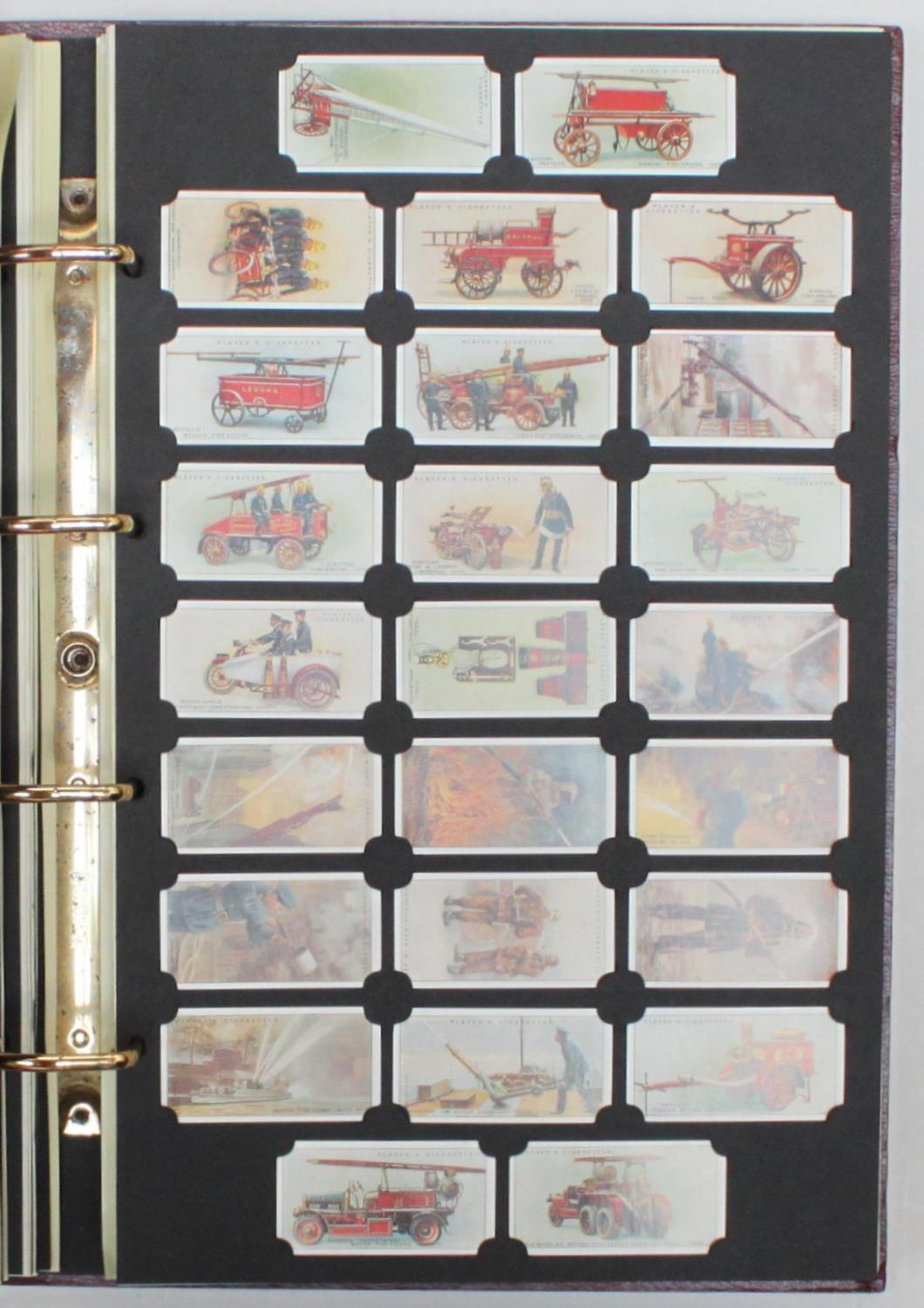 A 'Card Collector's Society' gilt-tooled album of 28x reprinted sets with info sheets - Bild 2 aus 3