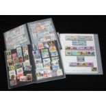 A schoolboy collection of assorted used GB and world stamps across three stockbooks, predominantly