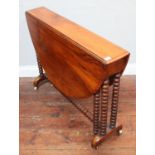 A Victorian stained walnut oval drop-leaf Sutherland table, with bobbin-turned supports and gate-