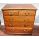 A mahogany chest of two short over three long graduated, mahogany lined drawers by James Shoolbred &