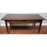 An antique stained and polished elm rectangular kitchen table, with two side-frieze drawers,