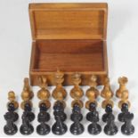 A Jaques 'Staunton' pattern boxwood and ebonised chess set, (one boxwood rook missing)