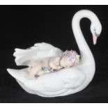 A Lladro porcelain figure of a swan carrying a sleeping baby, No. 06758, in original box