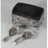 Two George III silver 'Old English' pattern caddy spoons with shell bowls and bright-cut decoration,