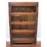 A Globe-Wernicke four-section stained oak glazed bookcase, 88cm wide