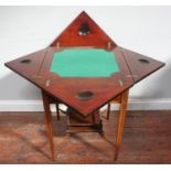 An Edwardian inlaid mahogany envelope folding card table, the top revealing a green playing baize,