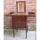 A George III mahogany night stand, with hinged top and rising adjustable mirror, pot cupboard and