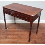 A 19th century mahogany side table, of rectangular form with two frieze drawers, turned pulls and