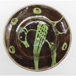 Michael Cardew O.B.E. (1901-1983) Winchcombe Pottery circular dish, decorated with a bird in green