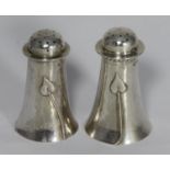 A pair of Art Nouveau silver peppers, of tapering cylindrical form, planished decoration, applied