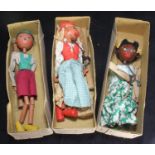 Three assorted boxed Pelham Puppets, one modelled as a young girl in floral dress with 'Infant