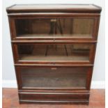 A Globe-Wernicke three-section stained oak glazed bookcase, 87cm wide