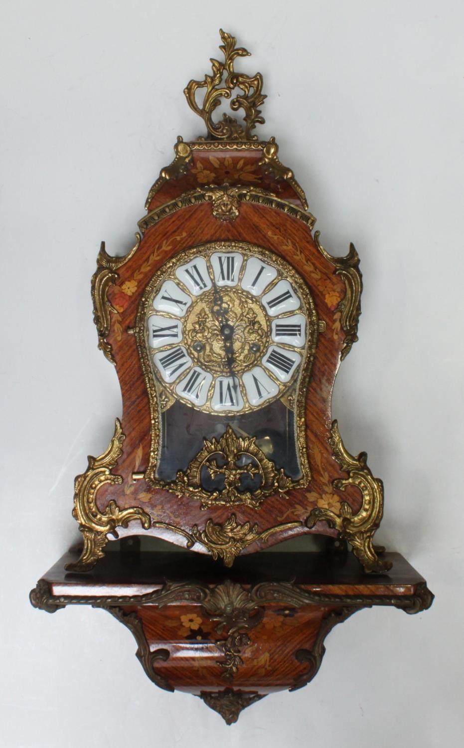 A contemporary French Bracket clock in the Louis XV style, brass and enamel dial with Roman