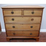 A 19th century faded mahogany chest of two short and three long mahogany-lined graduated drawers