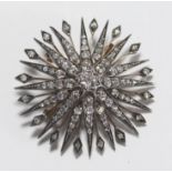 A 15ct gold silver-set sunburst brooch set with 3.00 carats of old-cut diamonds, total weight of