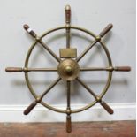 A brass eight-spoke ships wheel with wooden grips by Brown Bros. & Co, Rosebank Ironworks Edinburgh,
