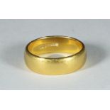 A gent's 22ct gold wedding band, approx. 13.7g, ring size W