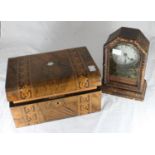 A Victorian walnut work box with twin parquetry bands and central mother-of-pearl inlay, together