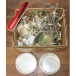 A quantity of silver-plated items including trays, glass claret jug, miniature coal scuttle,
