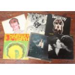 Approximately sixty vinyl albums including The Beatles, David Bowie, Captain Fantastic by Elton