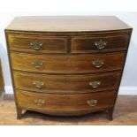 A 19th century bow-front mahogany chest of two short and three long graduated drawers, with