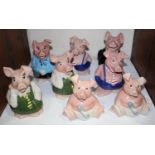 SECTION 32. A full set of five Wade Natwest pigs, plus three additional pigs all with stoppers (8)