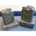 A WWII green painted ammunition box 46cm wide, together with another ammunition box numbered '