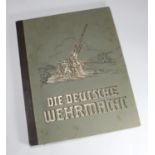 A WWII era German cigarette card album 'Die Deutsche Wehrmacht' the unified armed forces of Nazi