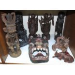 SECTION 7. A quantity of Oriental carved wooden figures including a full sized dragon or demon