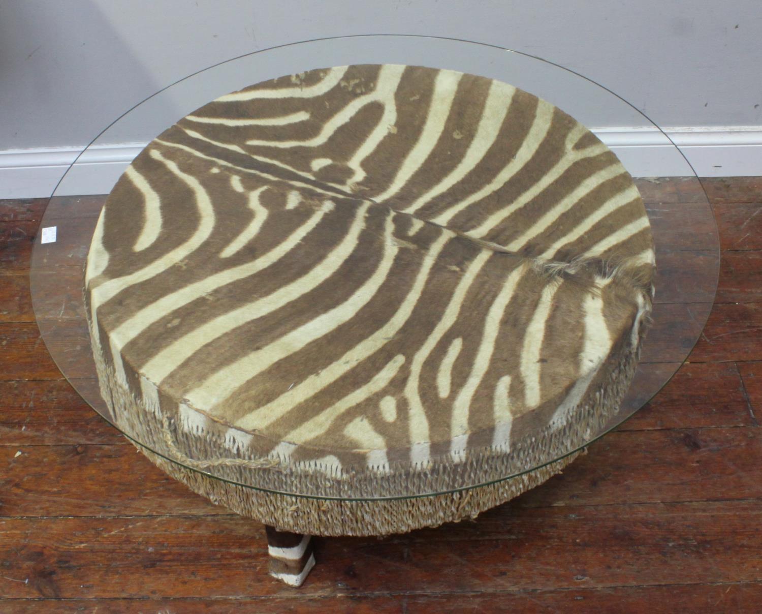 A large antique zebra hide floor drum table believed to be early 20th century with twisted rawhide - Image 3 of 6